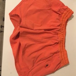 lululemon athletica Shorts - Bright orange tracker short lululemon shorts 4” lululemon athletica Shorts - Bright orange tracker short lululemon shorts 4”